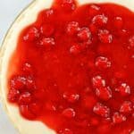 The top of a cherry cream cheese pie.