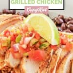 Homemade Chili's margarita grilled chicken topped with pico de gallo and a lime wedge.
