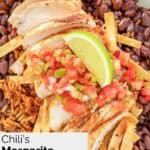 Homemade Chili's margarita grilled chicken over black beans and Mexican rice.