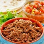 Homemade Chipotle barbacoa, cilantro, pico de gallo, and tortilla shells.