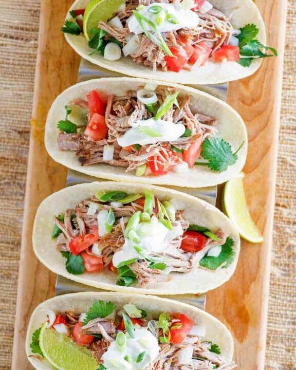 Copycat Chipotle carnitas in tacos.