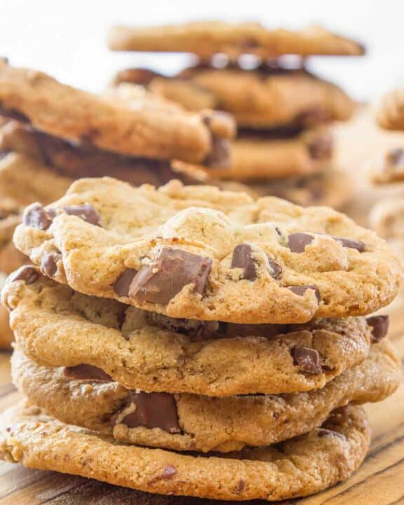 Homemade chocolate chippers in stacks.