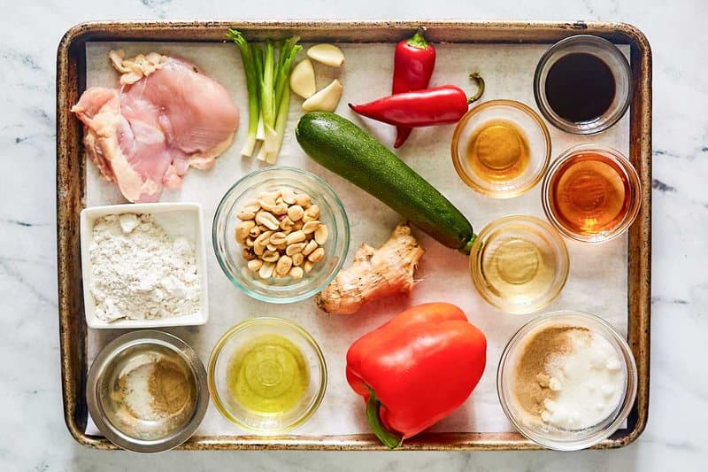 Copycat Panda Express kung pao chicken ingredients on a tray.
