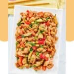 Homemade Panda Express kung pao chicken on a large plate.