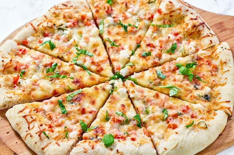 Copycat Red Lobster lobster pizza sliced.