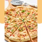Homemade Red Lobster lobster pizza on a pizza peel.