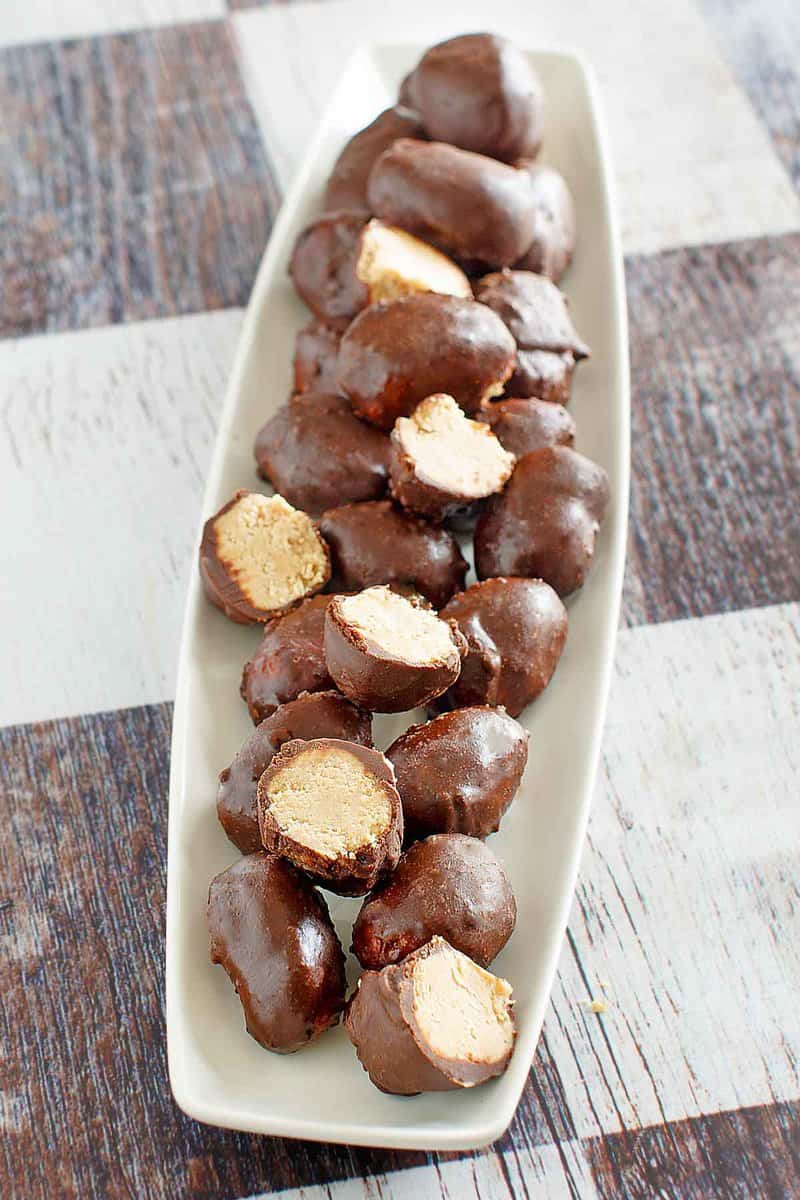 Copycat Reese's chocolate peanut butter eggs on a long platter.
