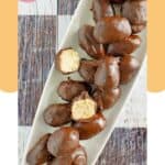 Homemade Reese's peanut butter eggs on a long platter.