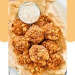 Homemade Texas Roadhouse rattlesnake bites and sauce in a serving basket.