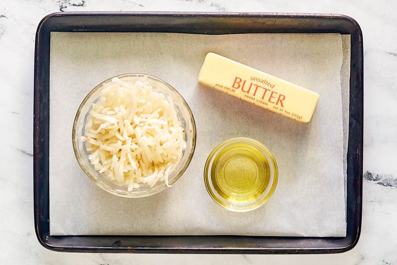 Copycat Waffle House hash browns ingredients on a tray.