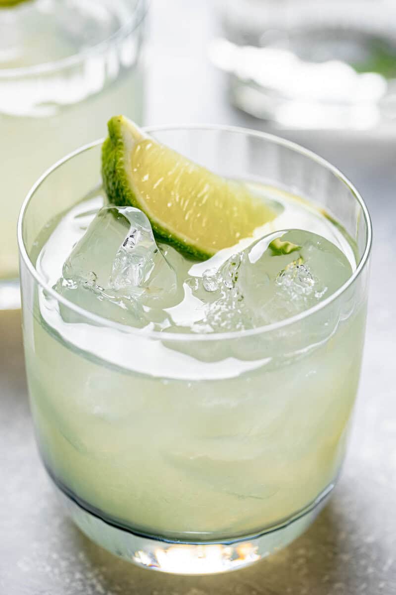 Copycat Chipotle Mexican Grill margarita garnished with a lime wedge.