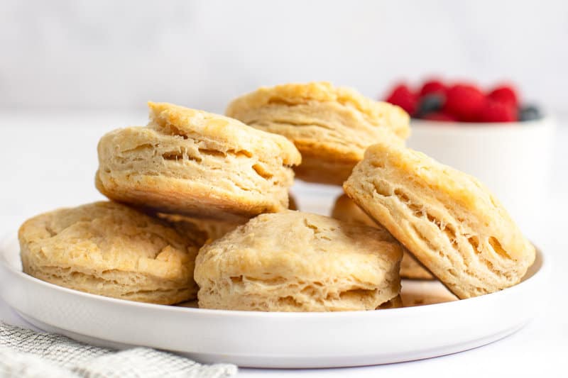 Homemade freezer biscuits on a plate.