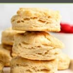 A stack of three homemade freezer biscuits on a plate.