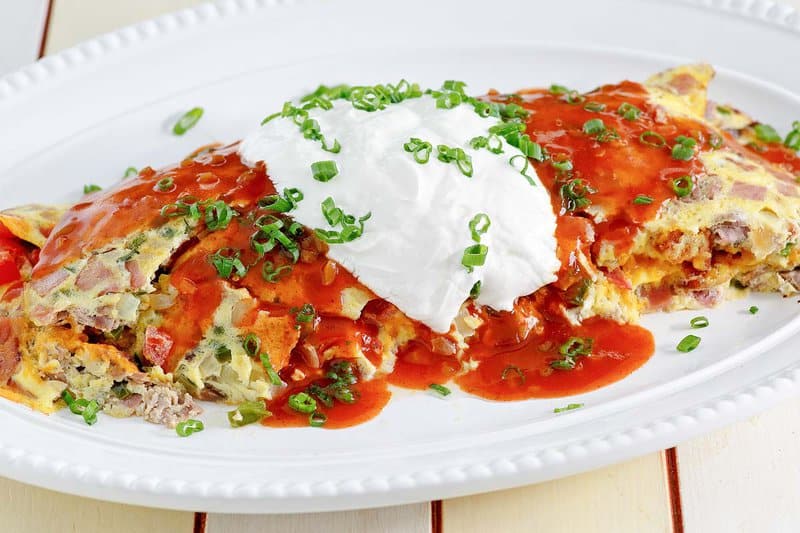 Copycat IHOP Colorado omelette on an oval plate.