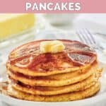 A stack of homemade IHOP protein pancakes topped with butter and syrup on a plate.