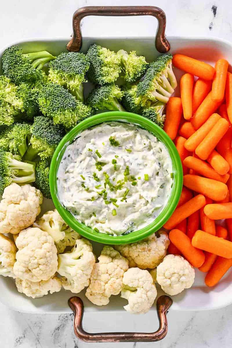 Copycat Melting Pot green goddess dip and fresh veggies on a tray.