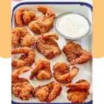 Homemade Red Lobster coconut shrimp and dipping sauce in a serving tray.