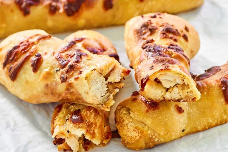 Copycat Costco chicken bake on parchment.