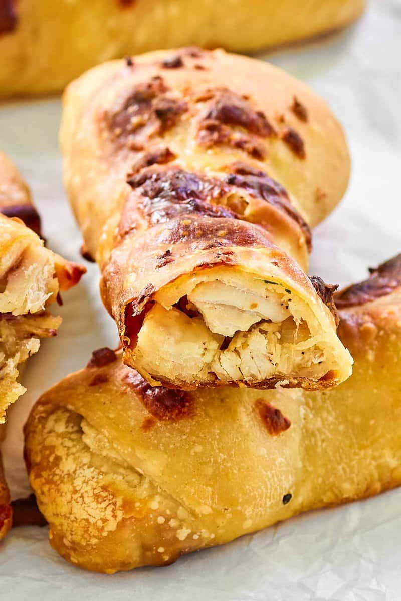 Copycat Costco chicken bake on parchment paper.