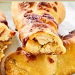 Homemade Costco chicken bake cut in half and on top of another one.