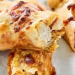 Homemade Costco chicken bake cut in half.