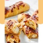 Several homemade Costco chicken bakes on parchment paper.