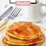 Homemade McDonald's pancakes with maple syrup on a plate.