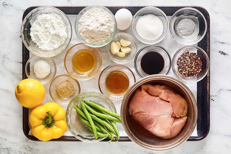 Copycat Panda Express honey sesame chicken ingredients on a tray.