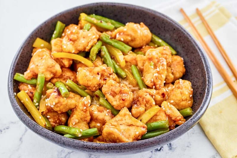 Copycat Panda Express honey sesame chicken in a serving bowl.