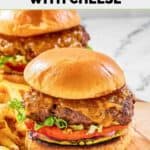 Two homemade Chili's old timer burgers on a wood board.