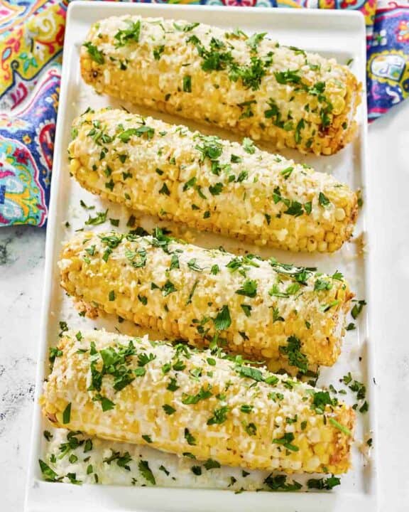 Copycat Chili's roasted street corn on a platter.