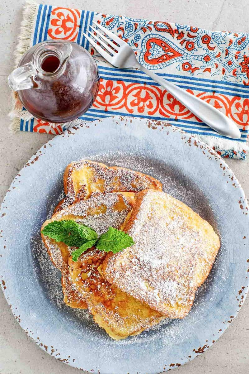 Copycat Denny's French toast garnished with fresh mint.