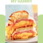 Copycat Denny's moons over my hammy breakfast sandwich on a plate.