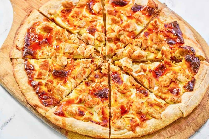 Sliced copycat Domino's Buffalo chicken pizza.