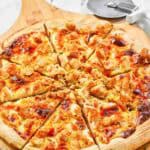 Copycat Domino's Buffalo chicken pizza on a pizza peel.