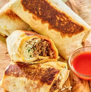 Copycat Taco Bell quesaritos on a wood board.