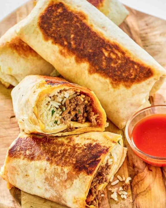 Copycat Taco Bell quesaritos on a wood board.