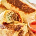 Homemade Taco Bell beef quesaritos and taco sauce.