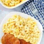 Copycat Boston Market mac and cheese in a baking dish and on a plate.