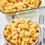 Copycat Costco mac and cheese in a bowl and baking dish.