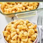 A bowl of homemade Costco mac and cheese and a fork next to it.