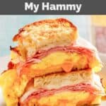 Homemade Denny's moons over my hammy sandwich halves stacked on a plate.