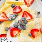 Homemade IHOP crepes with fresh berries on top.