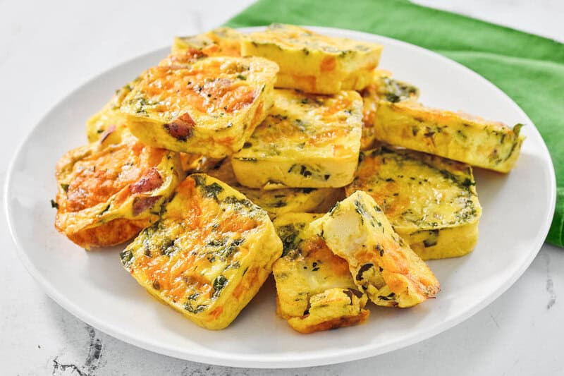 Copycat Starbucks potato cheddar chive bakes on a plate.