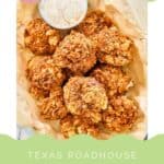 A basket of copycat Texas Roadhouse rattle snake bites and dipping sauce.