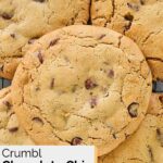 Homemade Crumbl chocolate chip cookies on a wire rack.