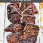 Homemade Fogo de Chao picanha steaks on a long platter.