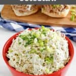 Homemade Houston's coleslaw in a bowl and two sliders behind it.