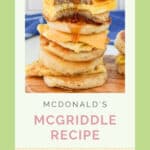Copycat McDonald's McGriddles with syrup being poured over them.