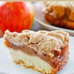 Apple crumb coffee cake slice on a plate.